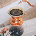 Hario copper kettle pouring into copper v60