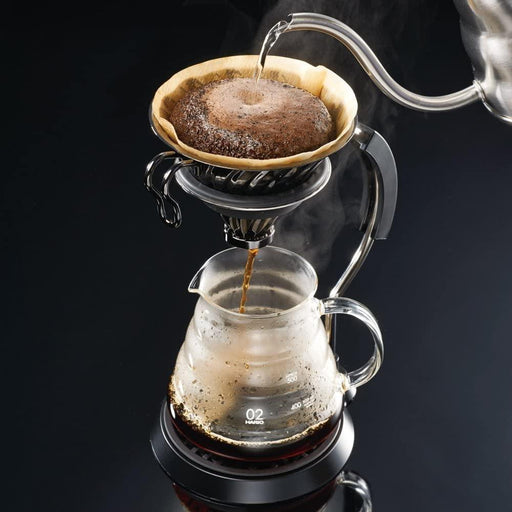 Hario_V60_Metal_Coffee_Dripper_Size_02_Silver_Dark_Background_hot_coffee_being_poured kettle