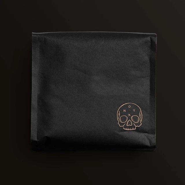 Onyx Echelon 10 Ounce bag of whole bean coffee, black bag with skull Onyx Coffee Lab logo